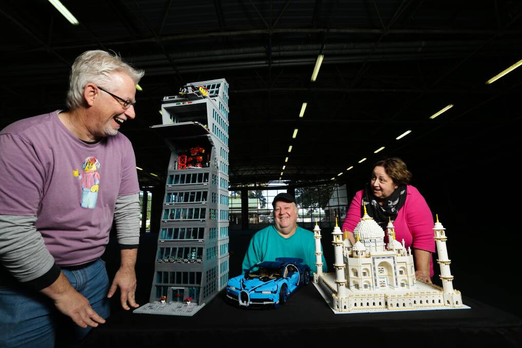 Fun for all: Kevin Evans with his Avengers tower, Kevin Blackburn with his Bugatti Chiron and Jo Holley with her Taj Mahal. Picture: Jonathan Carroll