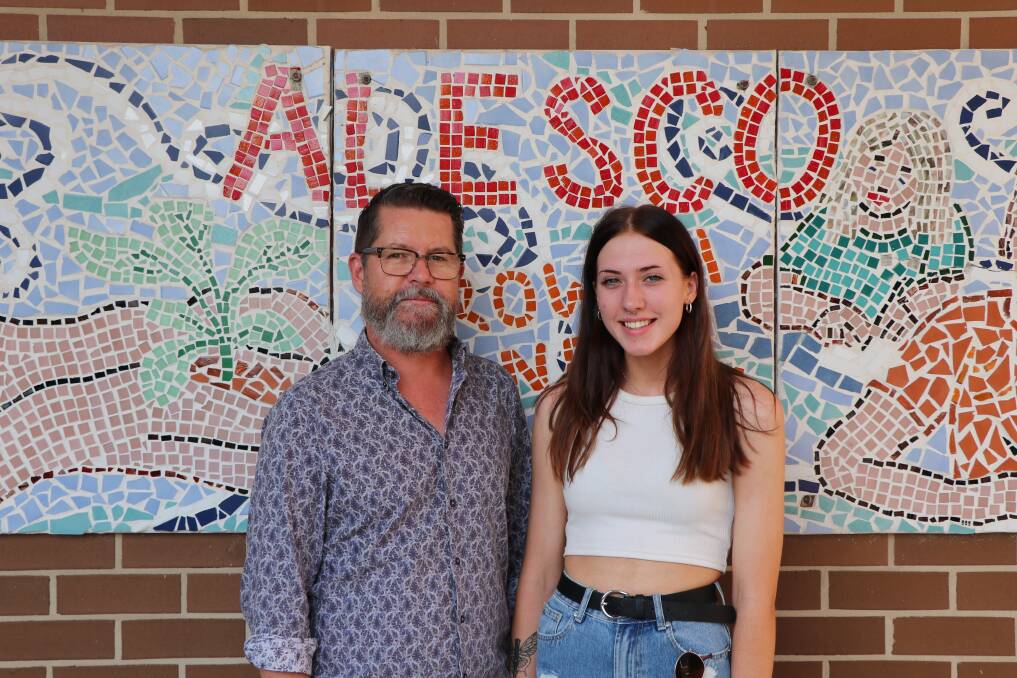 Star: Teacher Justin Henderson with Maikayla Smith-Wilson, who said she was "going to give myself a big old pat on the back" after the HSC. 