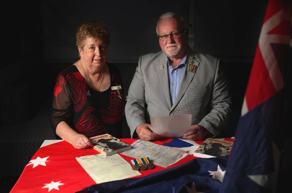 Never forget: Yvonne Fletcher and John Gillam said the two soldiers' names were listed on the Hinton Public School Memorial, Hinton School of Arts Honour Roll and at the Australian War Memorial. Picture: Marina Neil