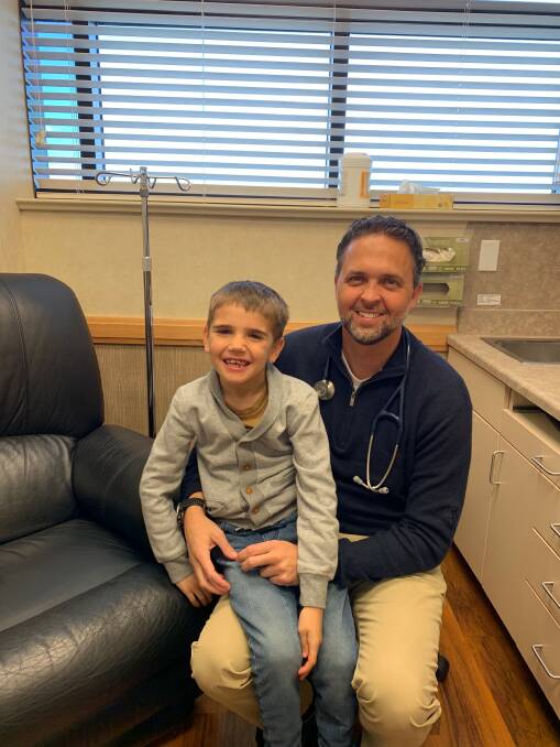 Trust: Liesel Allen said Dr Jones, pictured with Isaac, is trying to bring OIT to Australia. "We felt so elated and positive to be at the clinic [to start OIT]."
