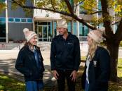 Courageous: Abby Ward, Mark Hughes and Tess Peel. Hughes said he saw every beanie as a "symbol of hope". Picture: Max Mason-Hubers
