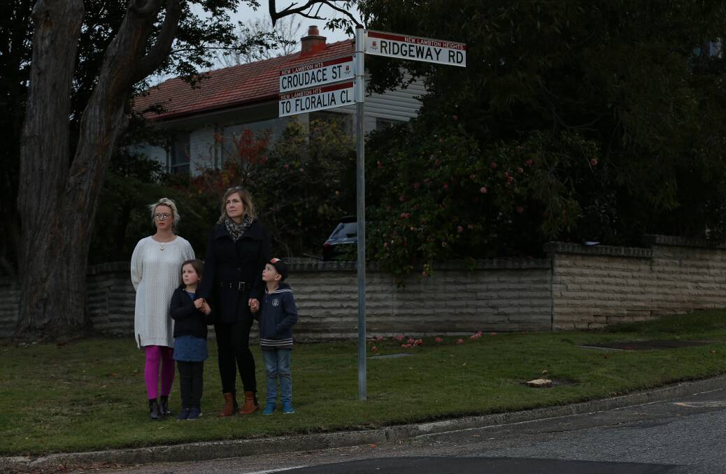 Concern: Erin Kenneally and Lena Vestad Hansen, with her children Matilda and Magnus, said Wallsend South is a good school, but not the local school they had planned their children would attend. Picture: Simone De Peak