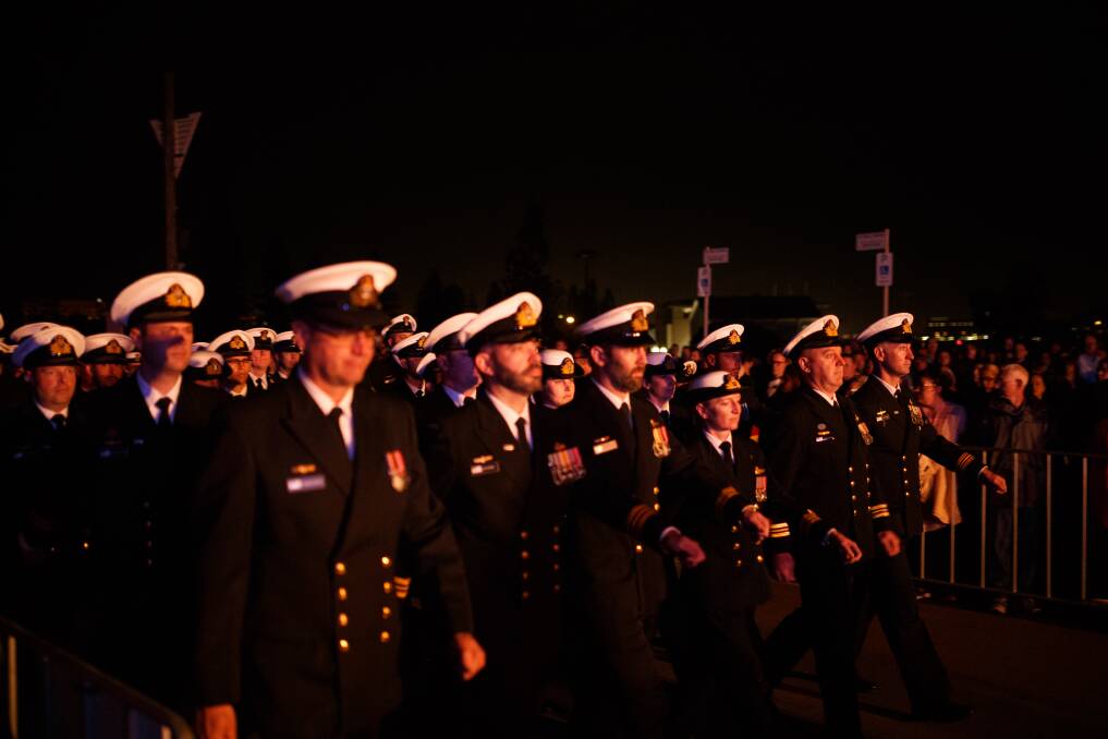 Service men and women at the 2017 dawn service at Nobbys beach. Picture: Max Mason-Hubers
