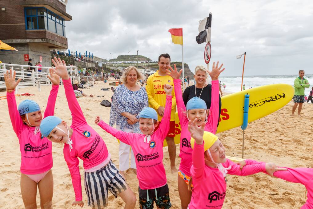 Celebrate: Bernadette Inglis, Hunter Youth Surf Lifesaver of the Year Riley Petherbridge and Rhonda Scruton. Picture: Max Mason-Hubers