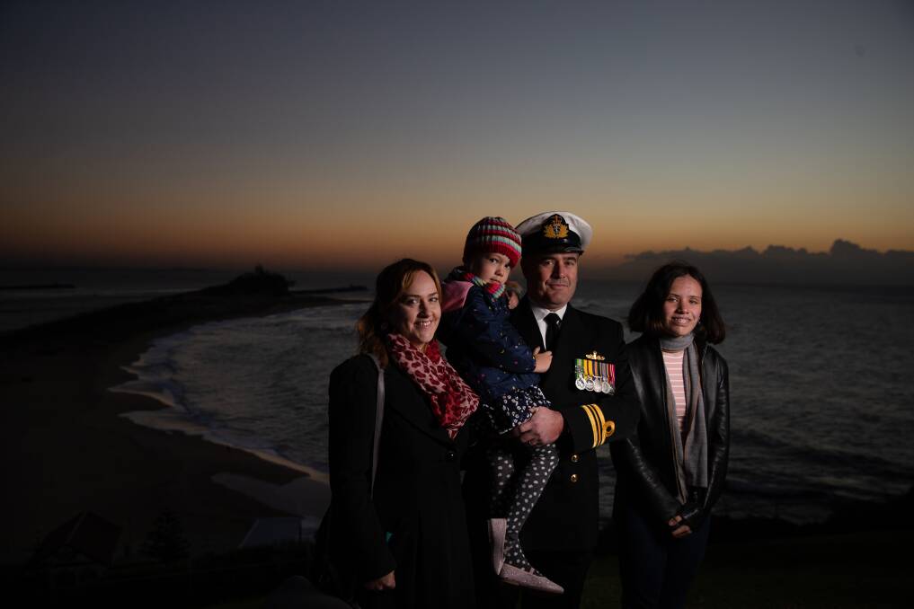Lessons: Lieutenant Commander Ben Scott, wife Sarah and daughters Millie and Scarlett. Picture: Marina Neil