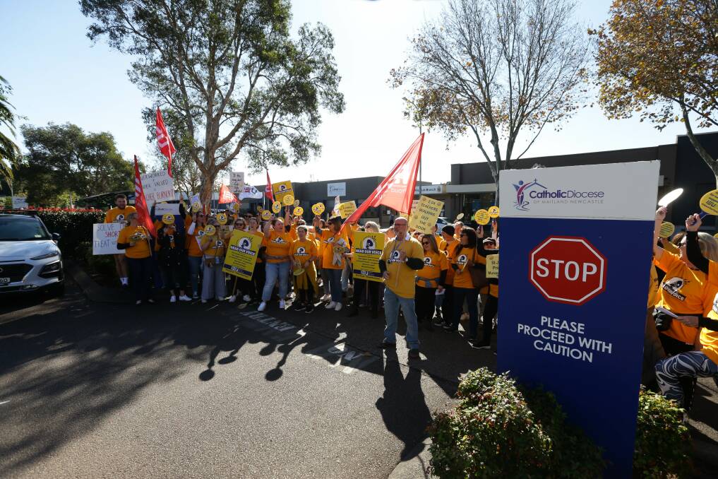 Speak up: Staff outside the Diocese of Maitland-Newcastle offices. Picture: Jonathan Carroll