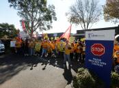 Speak up: Staff outside the Diocese of Maitland-Newcastle offices. Picture: Jonathan Carroll