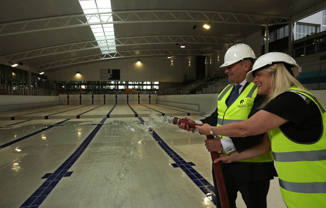 Filling up: Vice Chancellor Alex Zelinsky, with NU Sport's Deborah Wright, said the pool will be "truly world class". Picture: Simone De Peak