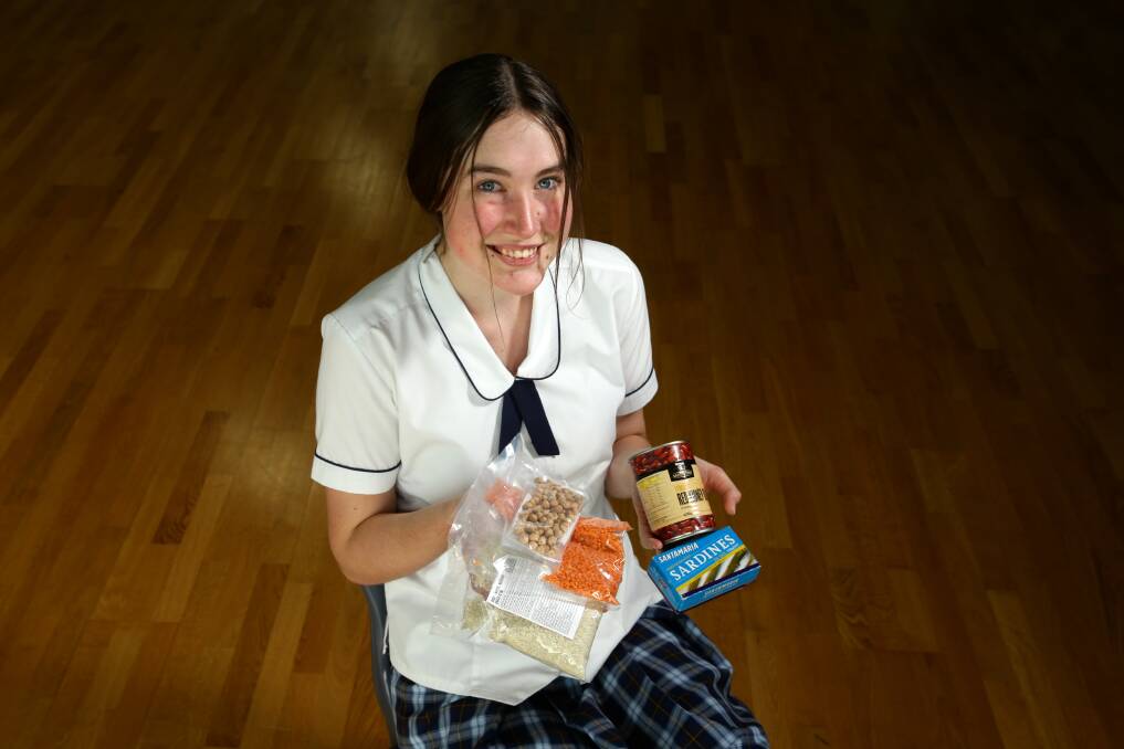 Think of others: Malika Knapp is living on rations from Monday to Friday. She said her first meal after the challenge was likely to be Grill'd hot chips and a vegan burger, plus a smoothie. Picture: Jonathan Carroll