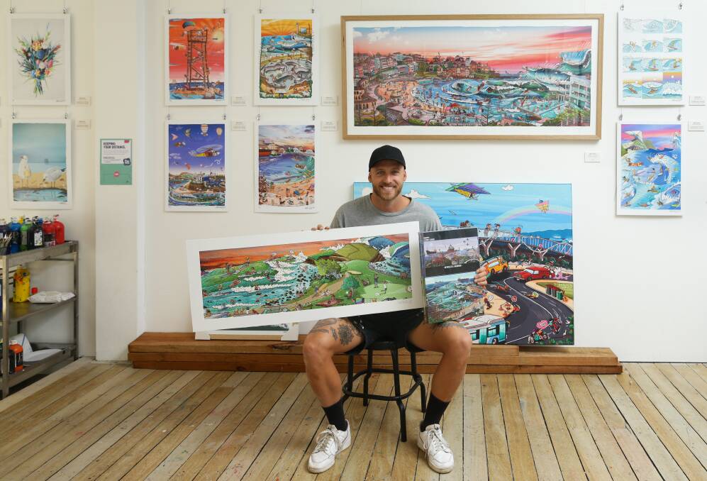 Creative soul: Mitch Revs, in his Hunter Street gallery, said his most popular puzzles are Merewether Beach and his panoramic versions of Newcastle Beach and Bondi Beach. Picture: Jonathan Carroll