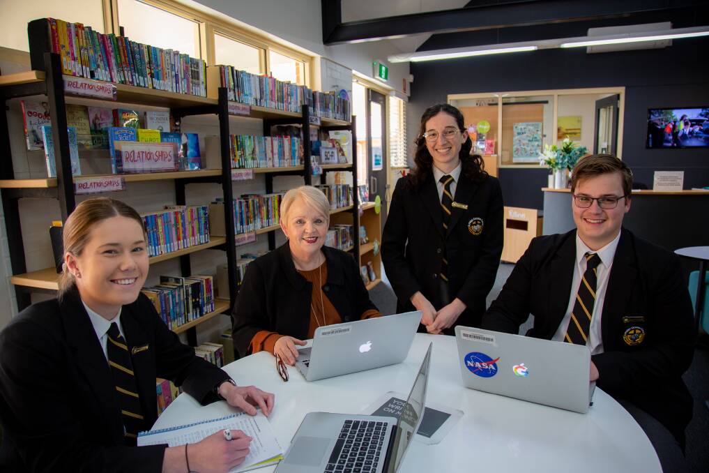 Resilient: Pam O'Dea with year 12 students (left to right) Brook Van der Velde, Emily Baker and Samuel Phillips.