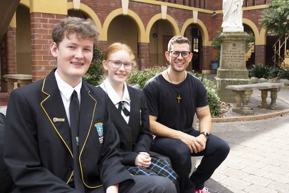 Father Rob Galea, with students, said his job was to inspire people to love and love Jesus. "This gives a leg up for the work that's being done at a local level in mission and in maintenance."