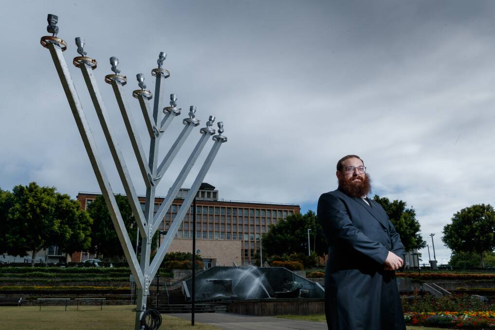 Rabbi Yossi Rodal with a menorah in Civic Park. According to the Jewish calendar this is the year of gatherings. Picture by Max Mason-Hubers