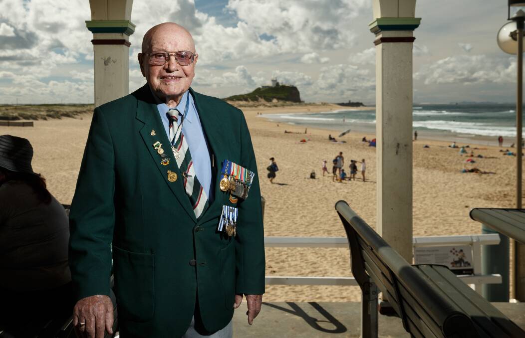 Local by choice: Alf Carpenter, pictured for his 100th birthday in 2017, fought in several theatres of World War II before a joint decision while waiting for rescue saw him settle in Newcastle. Picture: Max Mason-Hubers.