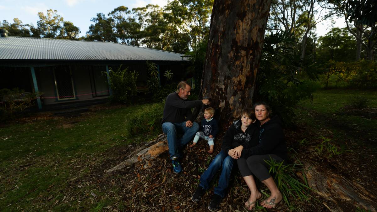 Deb and Rod Moroney with son Ethan Armstrong and baby Noah Armstrong at their home in Salt Ash on Thursday. Picture: Jonathan Carroll