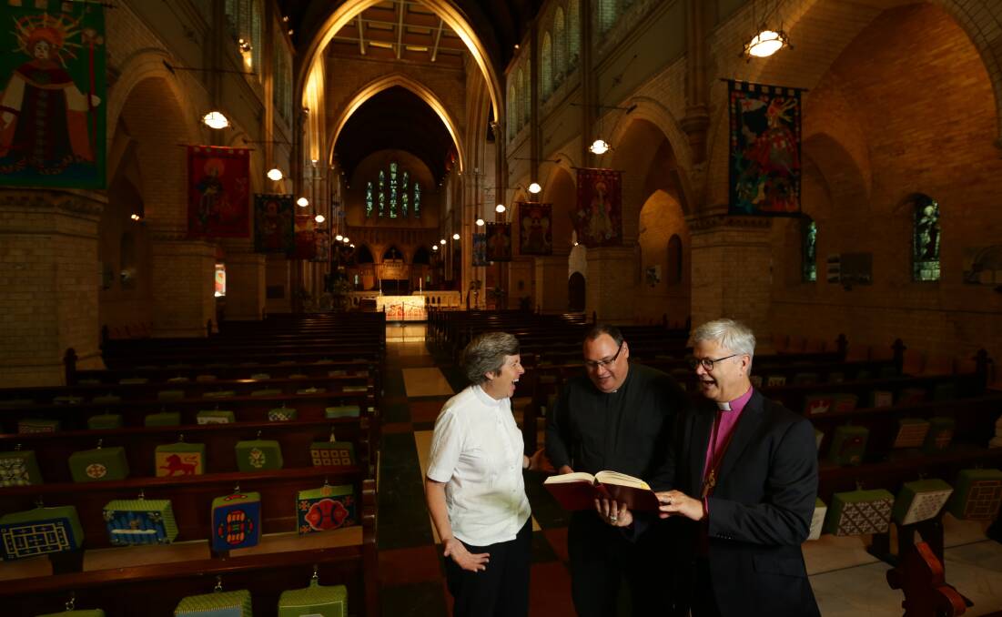 Anglican Diocese of Newcastle Bishop Peter Stuart, right, welcomes Archdeacons Sonia Roulston and Charlie Murry following their dual appointment to assistant bishop. Picture: Jonathan Carroll