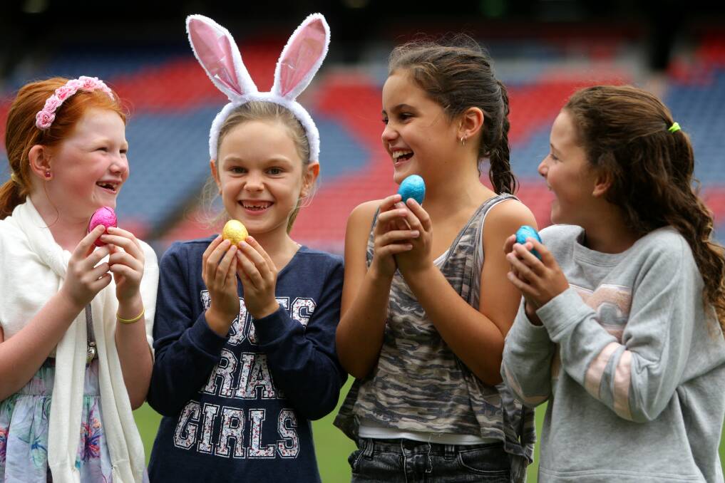 EGGS-CELLENT: Talia Cross, Ella Buderus, Marly Smith, Tia Pezet having a cracking time at last year's Knights Easter egg hunt. Picture: Jonathan Carroll