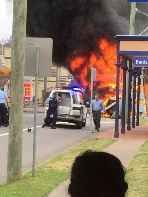 INTENSE: Police close the road as the truck catches alight. Picture: Supplied