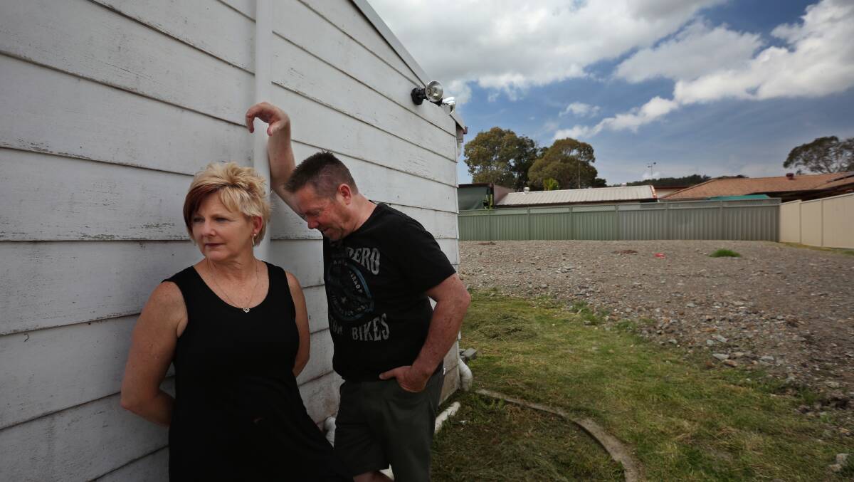 UNHAPPY: Trudi Field and Martin Robertson, of Boolaroo, have spent $70,000 to get a dirt-covered backyard due to pollution from the former Pasminco lead and zinc smelter. Picture: Marina Neil