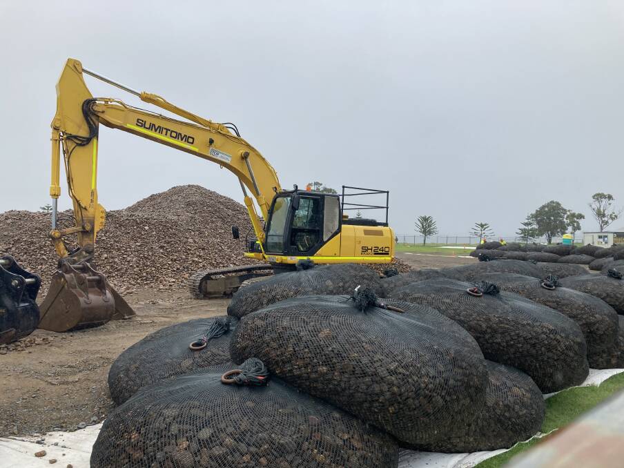 SHORE THING: Rock bag assembly works at Stockton. The large bags will be used, similar to sand bags, to halt aggressive erosion on the beach near Barrie Cres.