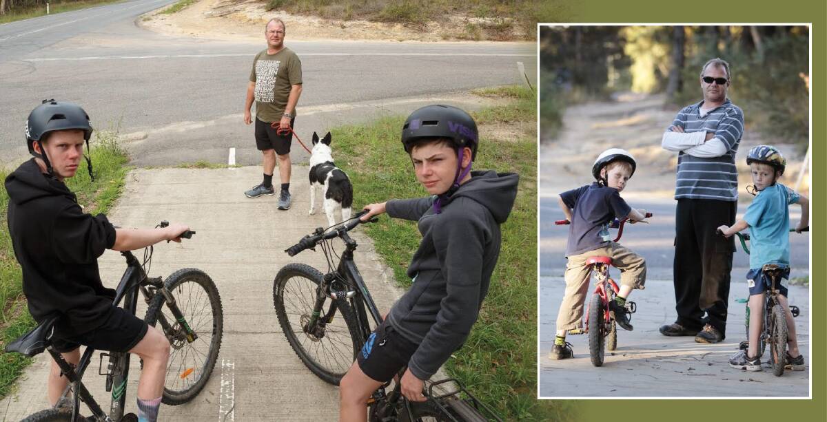 NOTHING CHANGES: David Lemcke, who has been calling for increased infrastructure on Morisset Peninsula for more than a decade, with sons Angus, left, and Sam at the end of the cycle path that goes to nowhere at Bonnells Bay. Mr Lemcke, Angus, left, and James Blair at the same spot in 2012. Picture: Max Mason-Hubers.