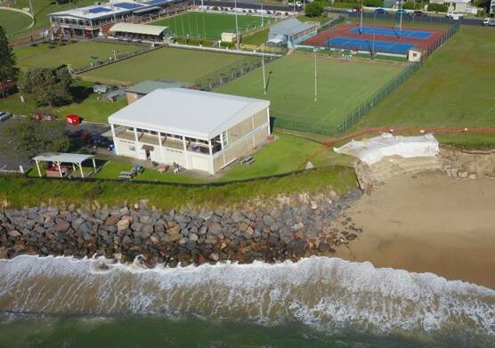 CUTTING IN: An aerial drone picture by Stockton's John Chesworth reveals severe scarping at the northern end of the surf club rockwall as predicted by the NSW Coastal Council. 