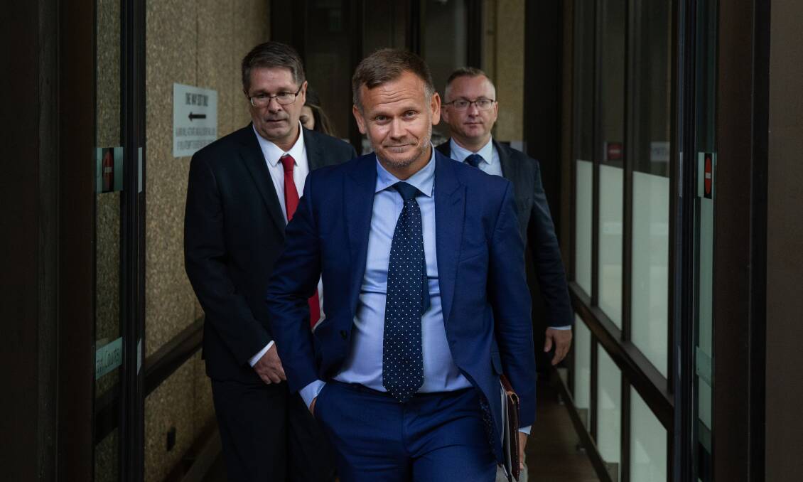 PUBLIC EXAMINATION: Lawyer Stefan Briggs, of SMB Law, and Harvest Homes liquidator Thomas Dawson, of DCL Advisory, right, and Brad Calvert, of DCL Advisory, left, leaving the Federal Court in Sydney this week. Picture: Marina Neil