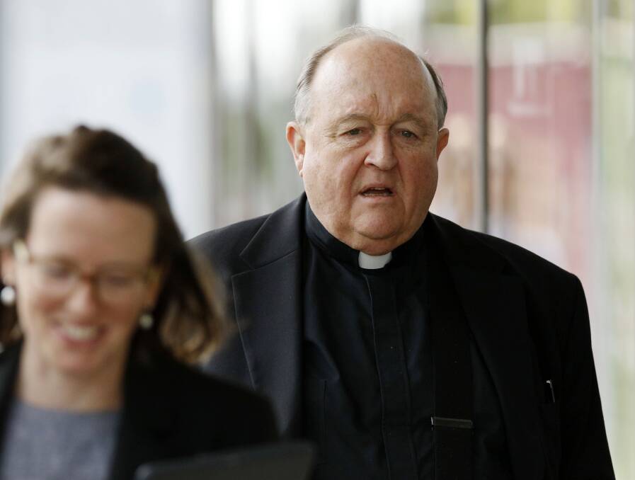 LANDMARK: Adelaide Archbishop Philip Wilson outside Newcastle courthouse on Friday where he appeared for allegedly concealing child sex allegations. The case will resume in April. Picture: Darren Pateman