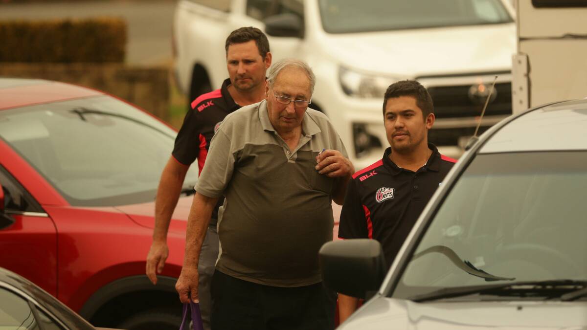 CONCERN: Newcastle City and Suburban Cricket Association management committee member Alf Smith arriving at a board meeting, along with two Cricket NSW representatives, on Thursday. 