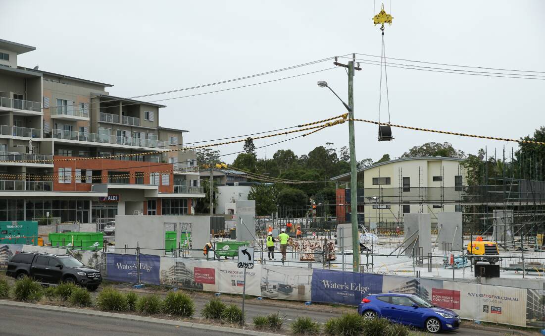 URGENT: Ausgrid was forced to disconnect high-voltage power mains after it discovered hoarding was erected too close at the Water's Edge construction site at Warners Bay. This photo was taken at the site in April.