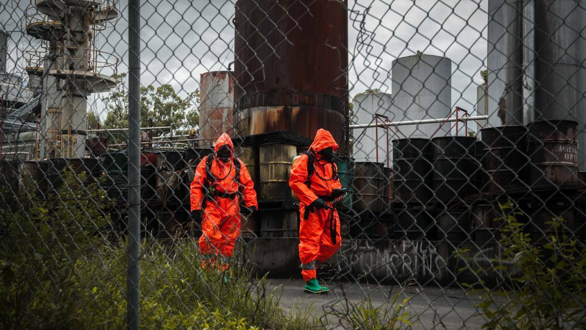 TOXIC: A Fire and Rescue NSW Hazmat crew inspecting Truegain's Rutherford site in March 2017. Picture: Perry Duffin