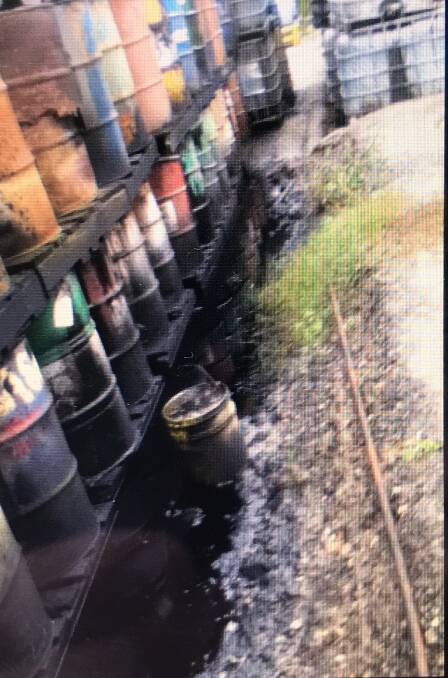 SPILL: A picture taken by a former worker of leaking oil drums at Truegain.