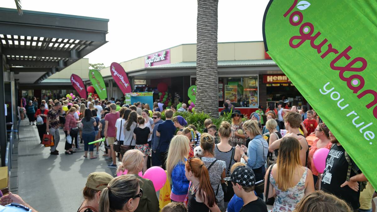 FROZEN FRENZY: Crowds queue for free frozen yoghurt on the opening day of the Yogurtland store at Marketown Shopping Centre, Newcastle West, in April 2014.