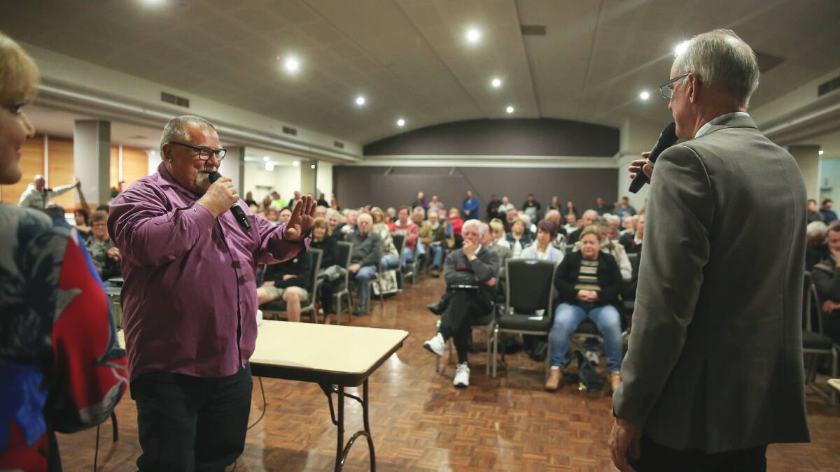 CALL FOR ACTION: Lake Macquarie MP Greg Piper, right, addressing a Boolaroo Action Group public meeting called earlier this month to discuss lead contamination in the area.