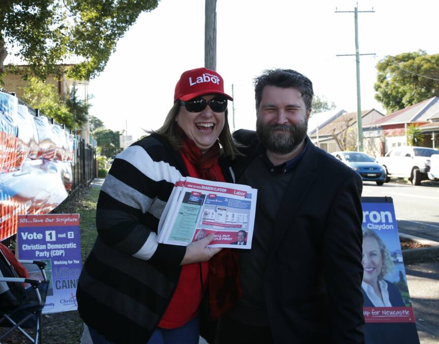 ALLIES: City of Newcastle councillor John Mackenzie with a Labor supporter outside a federal election polling booth at Islington in 2016. 