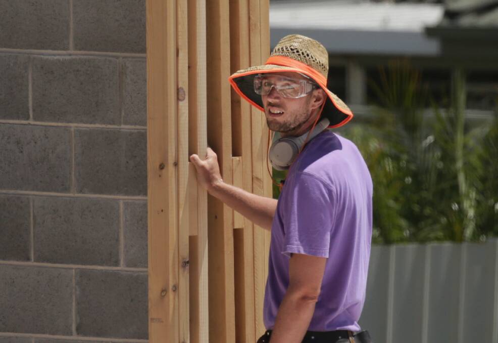 DODGY: Daniel Roberts, who is not a licensed builder but is a member of the Royal Institution of Chartered Surveyors, on the tools at his Wallsend development site.