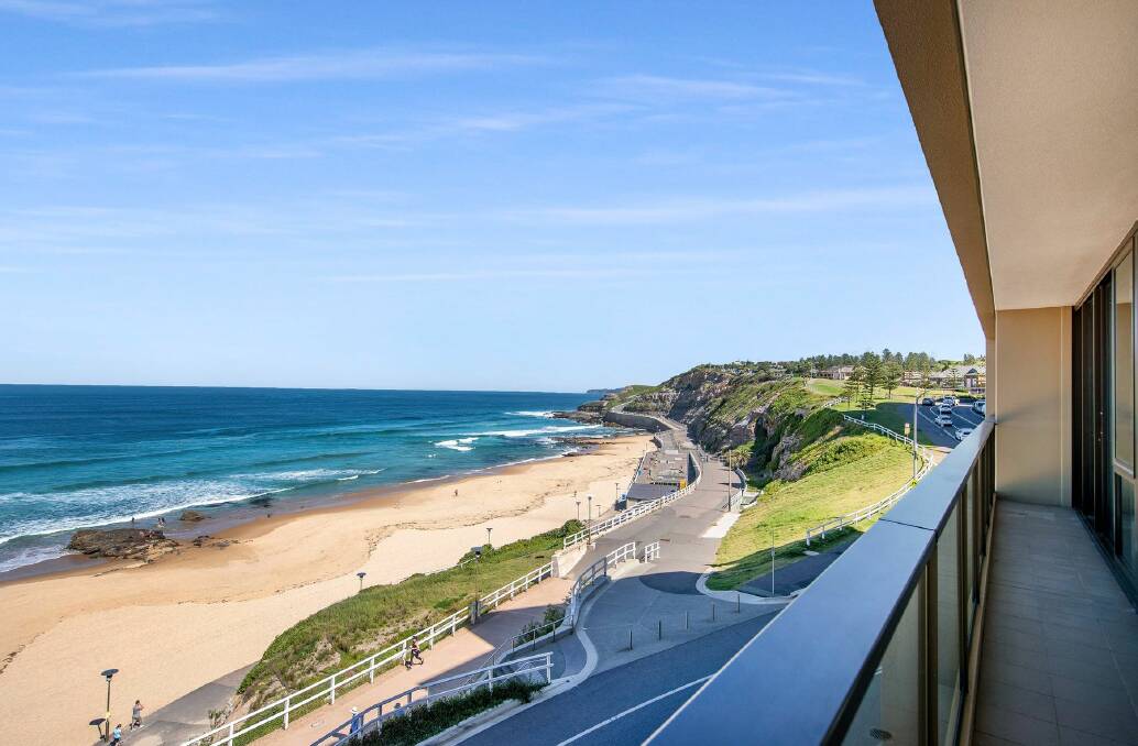 HIGH-FLIER: The view from notorious conman Lemuel Page's former Newcastle beach apartment that sold on the weekend for $1.8 million.