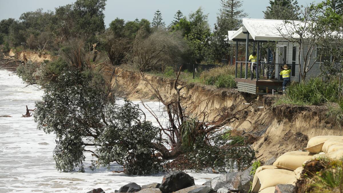 UNDER THREAT: Increased erosion on Stockton beach forced the relocation of cabins at the caravan park in February. Picture: Jonathan Carroll