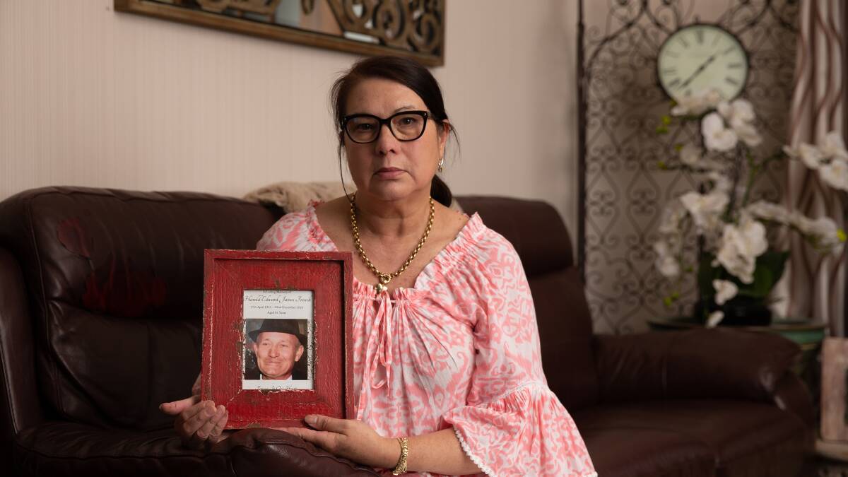 LOST: Tara French, holding a picture of her late husband Harold who was an investor, has known David Ashard for decades and is listed as owed $20,000. Picture: Marina Neil