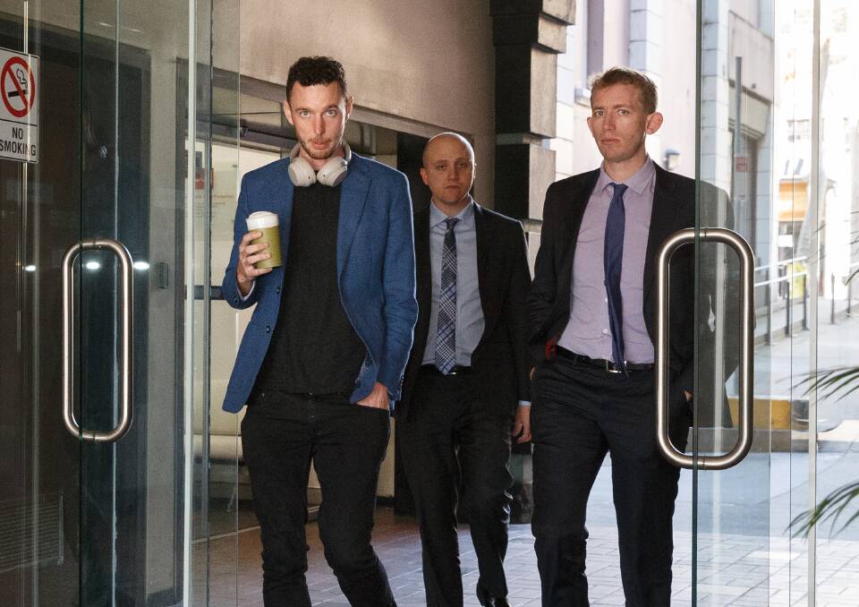 UNDER FIRE: Daniel Roberts, left, outside the NSW Civil and Administrative Tribunal with solicitor Jared Resevsky and barrister Patrick Williams, right. 