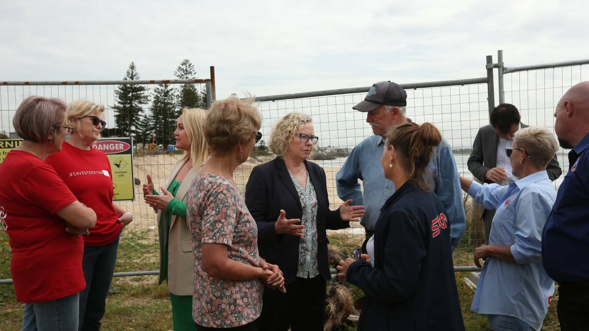 Newcastle Federal MP Sharon Claydon in Stockton, centre, with Newcastle lord mayor Nuatali Nelmes in October to announce the $6.2 million funding package to move 300,000 cubic metres of sand onto Stockton beach.