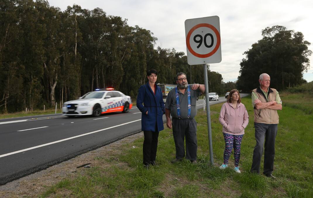 DANGER ZONE: Port Stephens MP Kate Washington, left, Tomago Rd residents Tony and Lea Formosa and Cabbage Tree Rd resident Wayne Sampson want the speed zone dropped along a 7.8km stretch of road from 90km/h to 80km/h.Picture: Simone De Peak