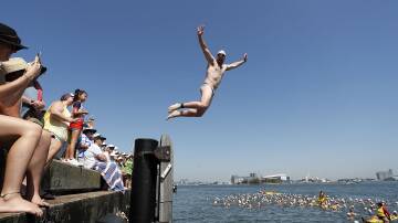 Discounted early-bird entries open for annual Newcastle Harbour swim. Picture: Daniel Danuser
