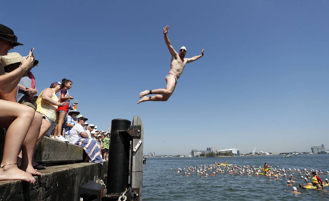 Discounted early-bird entries open for annual Newcastle Harbour swim. Picture: Daniel Danuser