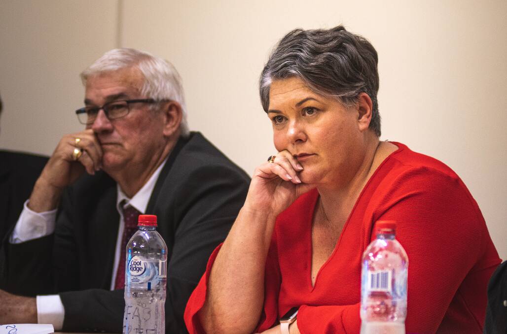 UNDER FIRE: Paterson MP Meryl Swanson and United Australia's Graham Burston faced tough questions at a federal election candidates' forum in Williamtown on Monday. Picture: Simon McCarthy