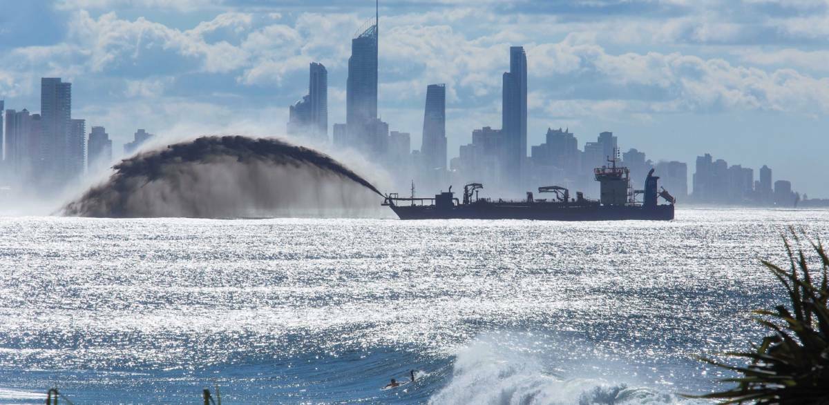 SAND AND DELIVER: A dredger pumping sand at the Gold Coast in the lead up to the Commonwealth Games. Picture: RN Dredging