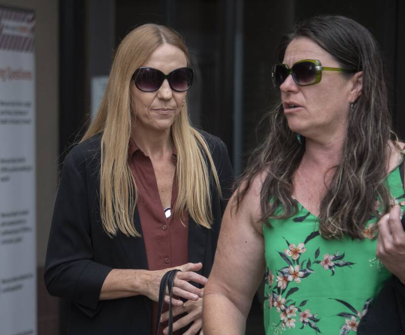 DESPERATE FOR ANSWERS: Jayden Penno-Tompsett's mother, Rachel Penno, left, and her friend outside court in Cairns. Picture: Brian Cassey