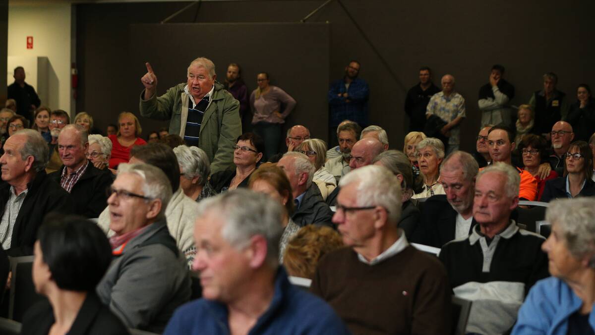 INJUSTICE: North Lake Macquarie residents pack a community meeting in Argenton last month calling for government assistance to clean up their land contaminated by the former Pasminco smelter. Picture: Marina Neil