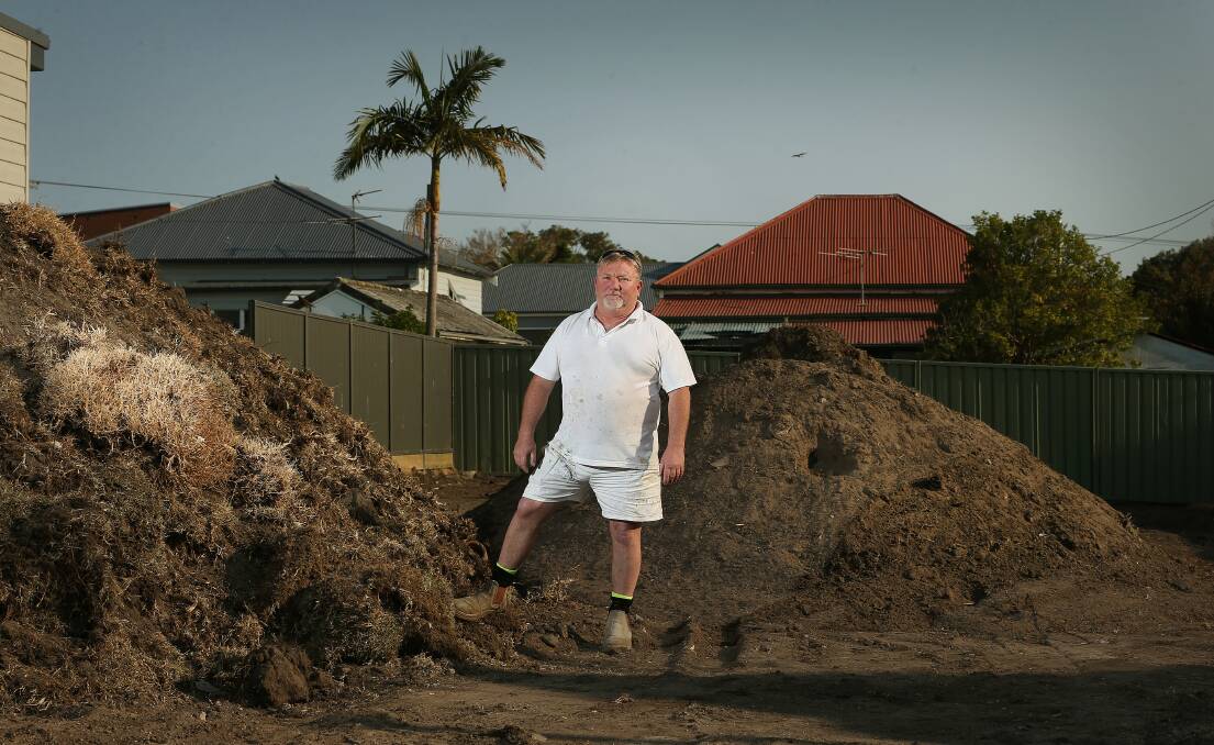FRUSTRATED: Boolaroo resident Mark Hambier tried for months to find a place in the Hunter to dump lead soil from his yard and eventually gave up. Picture: Marina Neil 