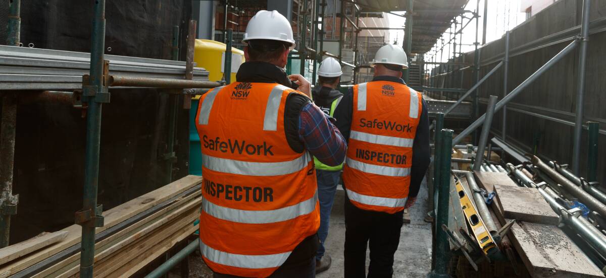 CRACKDOWN: SafeWork NSW inspectors during a recent week-long safety blitz of commercial and residential construction sites across the Hunter. Picture: Max Mason-Hubers